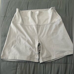 Light grey biker/medium length shorts, Yogalicious Lux brand size L.